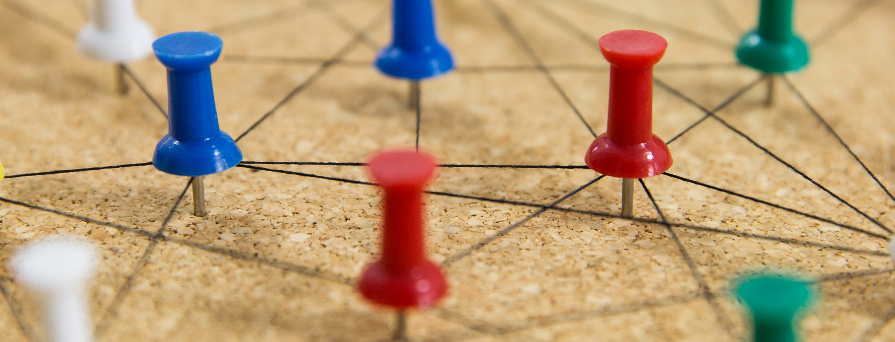 colorful pins on board, connection concept