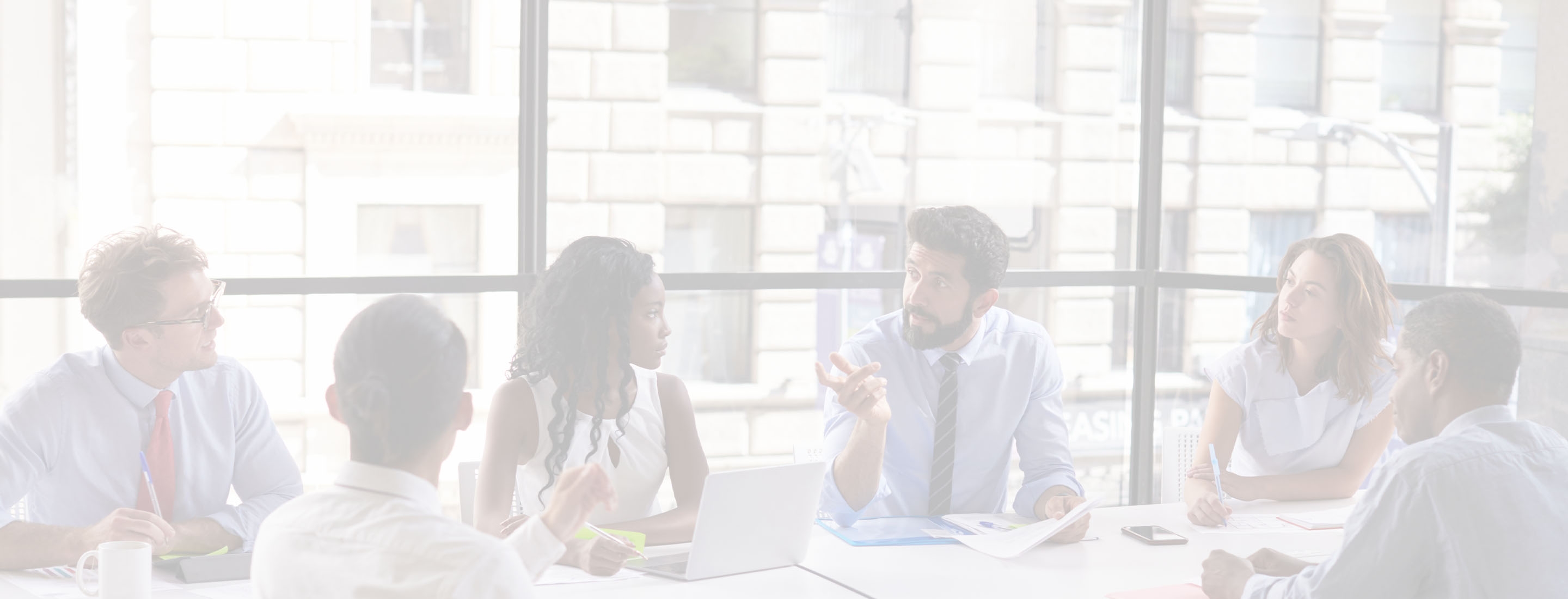 2880x1100 white overlay of a corporate business team and manager in a meeting, close up