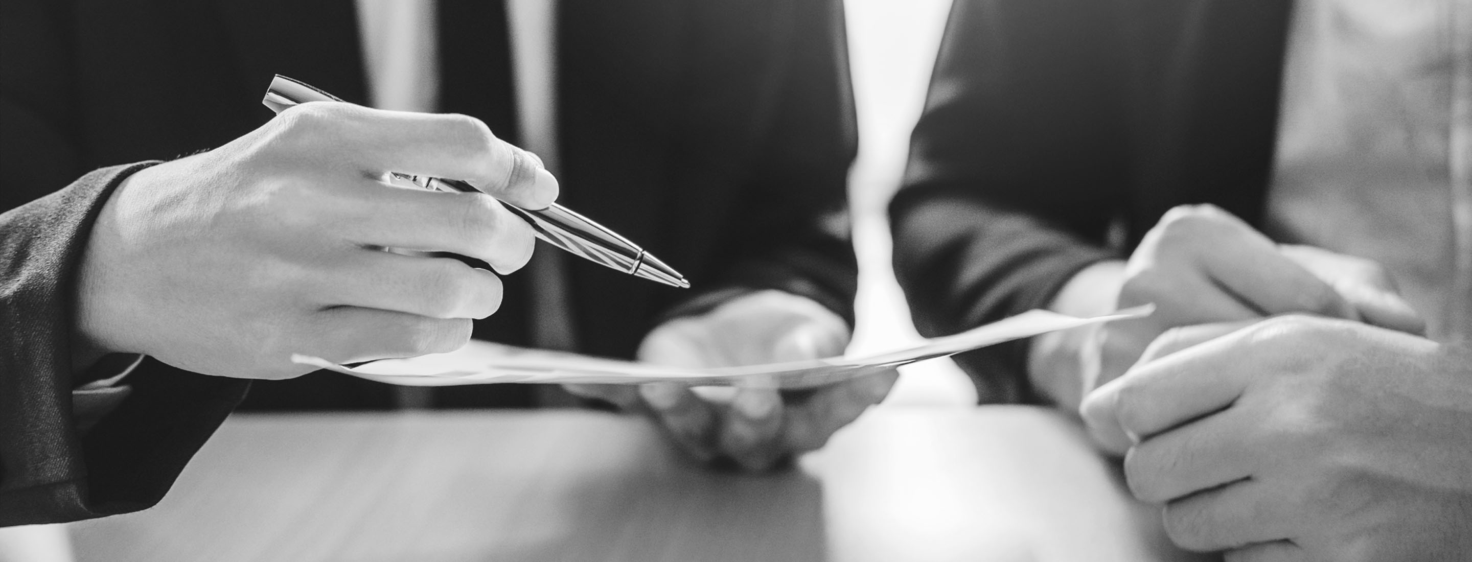 2880x1100 of business people Meeting negotiating a contract between two colleagues