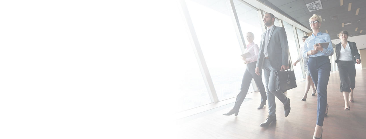 business people group walking in the hall