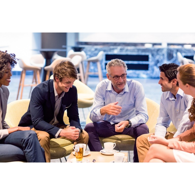 business-people-having-discussion-cafeteria