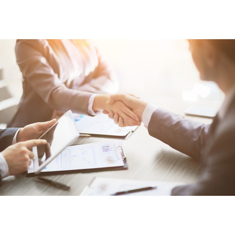 business-people-shaking-hands- finishing-meeting
