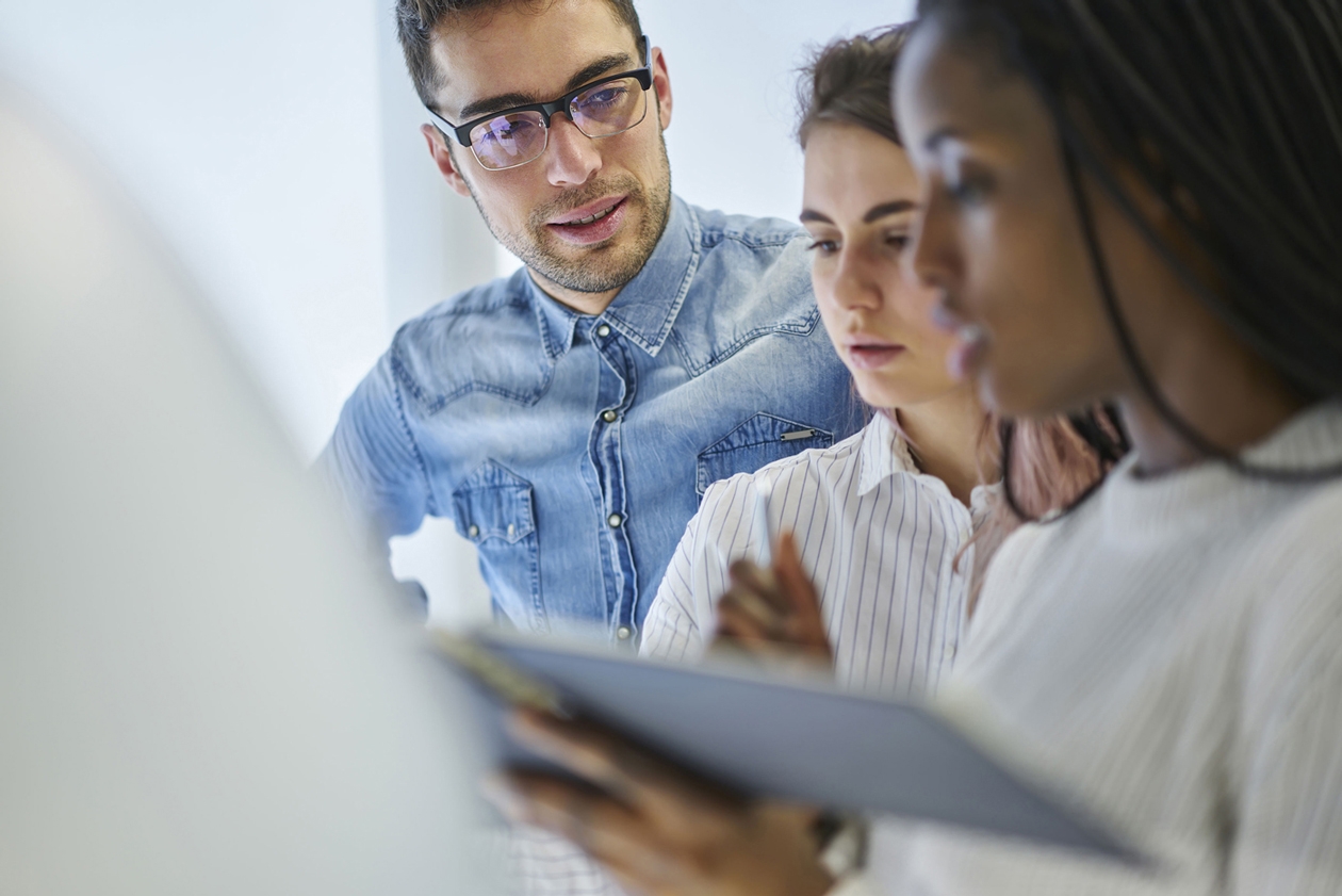 multicultural-male-female-professionals-planning-working-strategy