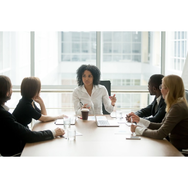 female-boss-leading-corporate-multiracial-team-meeting