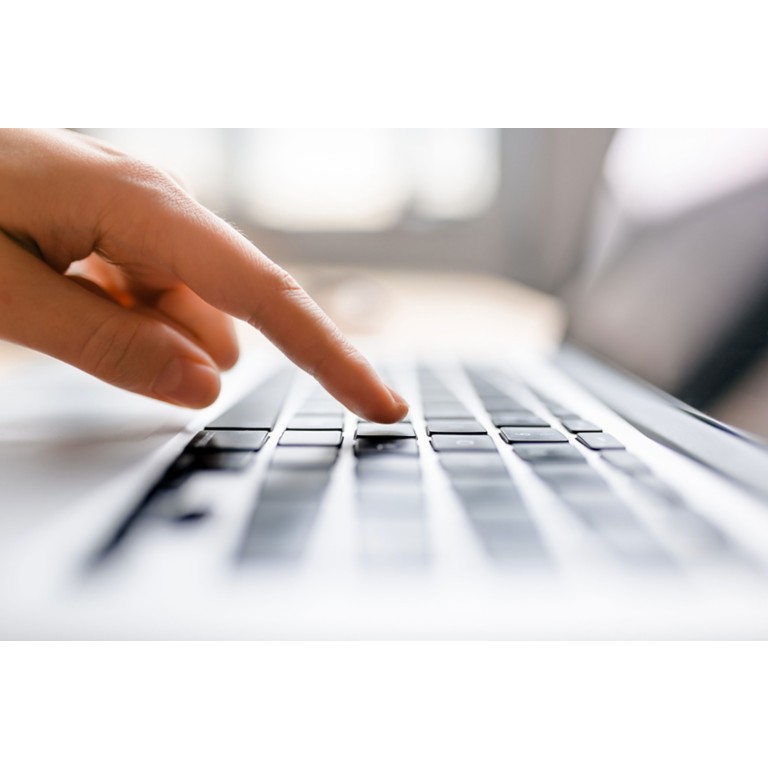 finger-press-button-laptop-keyboard
