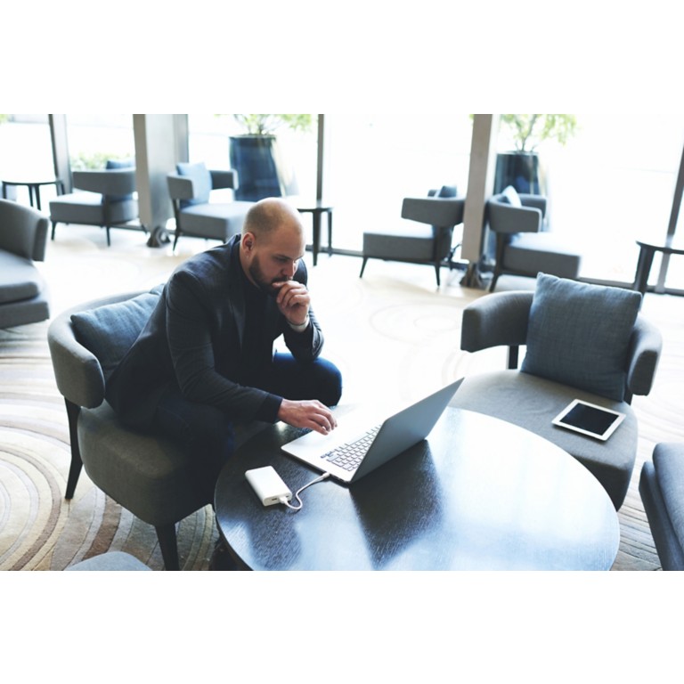 businessman-network-via-laptop