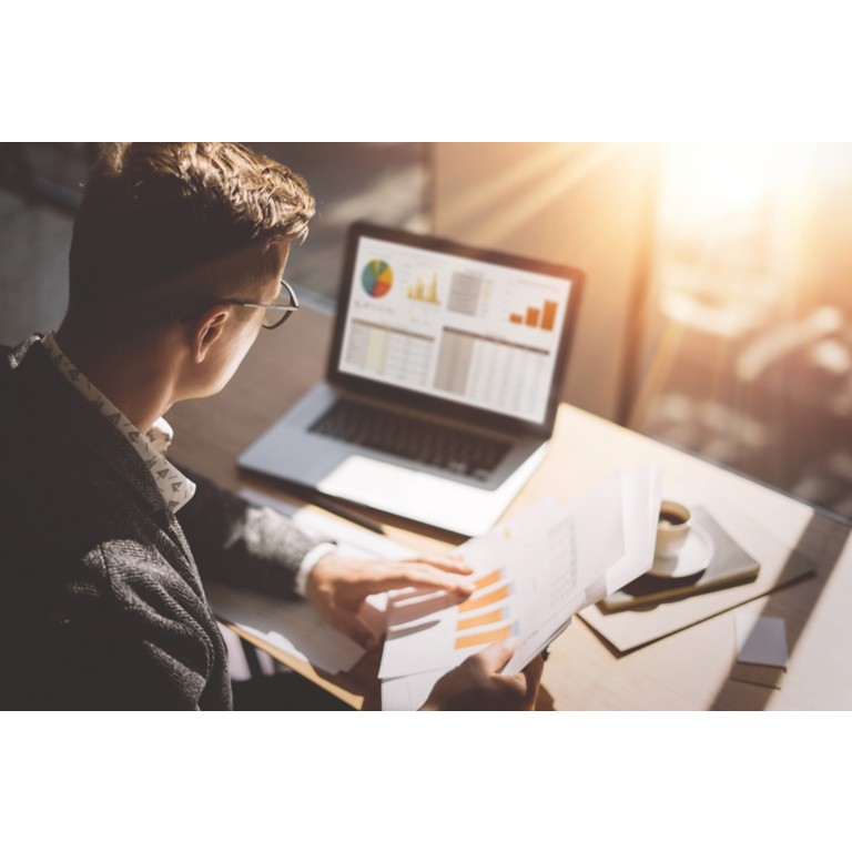 businessman-analyze-document-graphs-diagram-notebook-screen