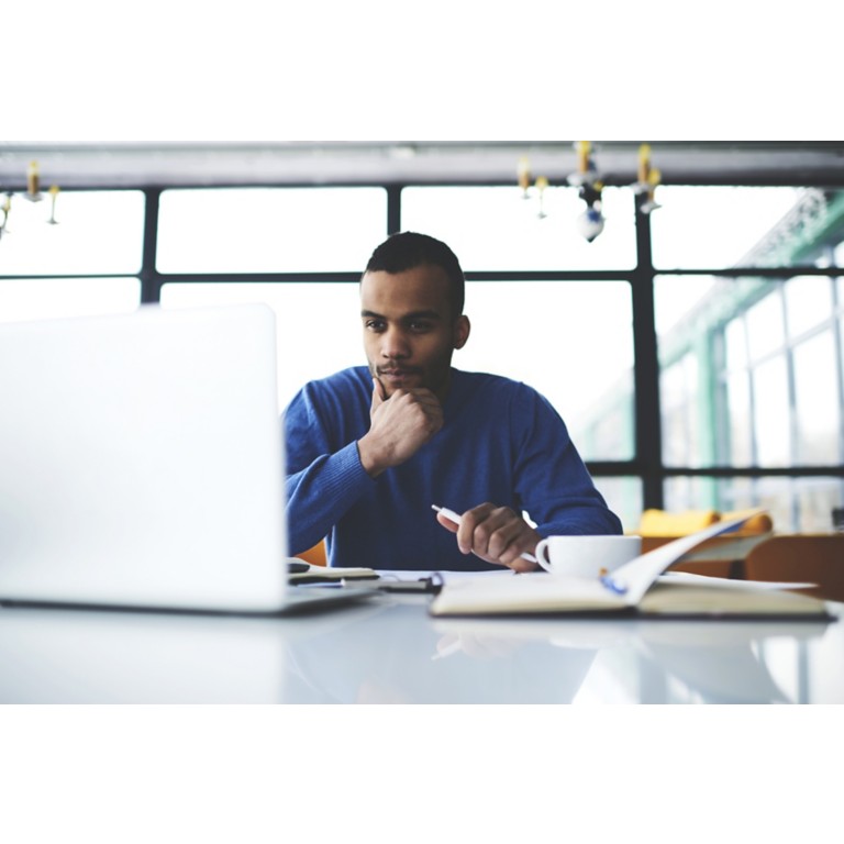 thoughtful-af-american-male-laptop-wifi