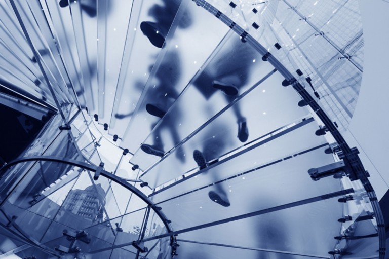 modern-glass-staircase-silhouette-walking-people