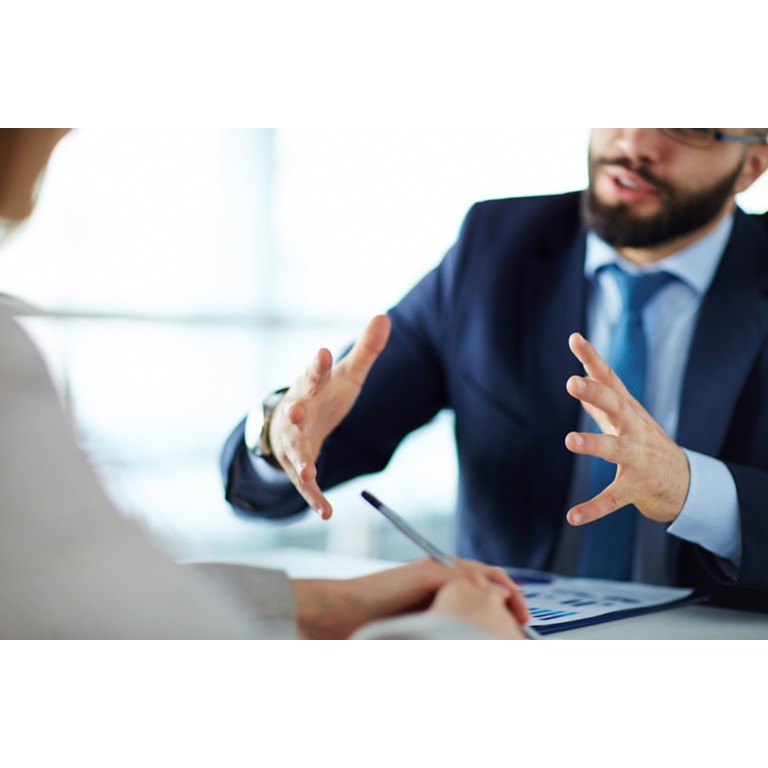manager-showing-estimated-earning-growth-colleague