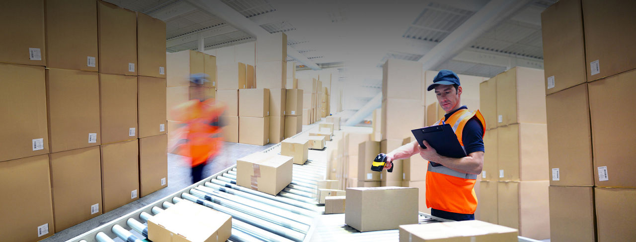 2880x1100 of workers in a goods warehouse - storage and transport of goods by mail order