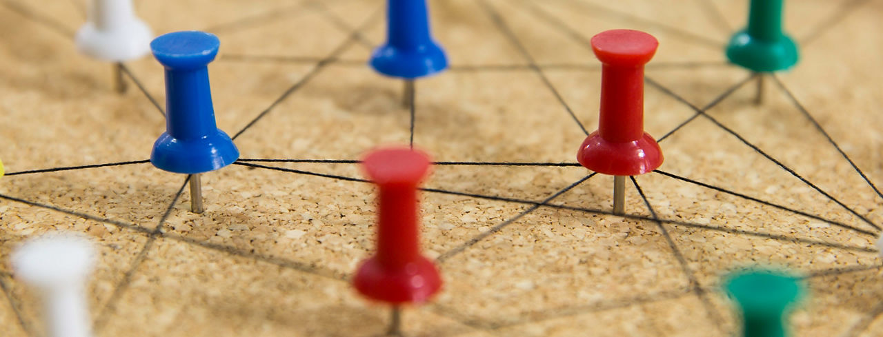 colorful pins on board, connection concept