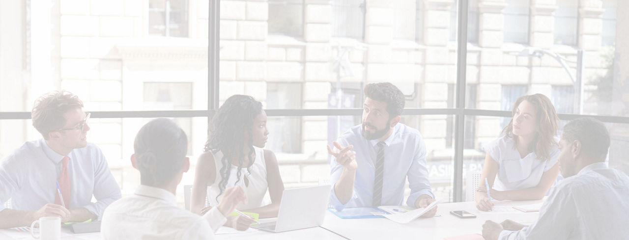 2880x1100 white overlay of a corporate business team and manager in a meeting, close up