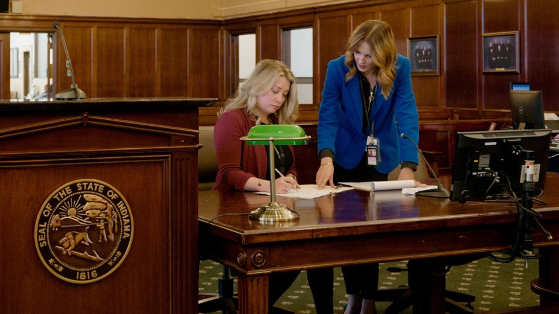 People at a court desk